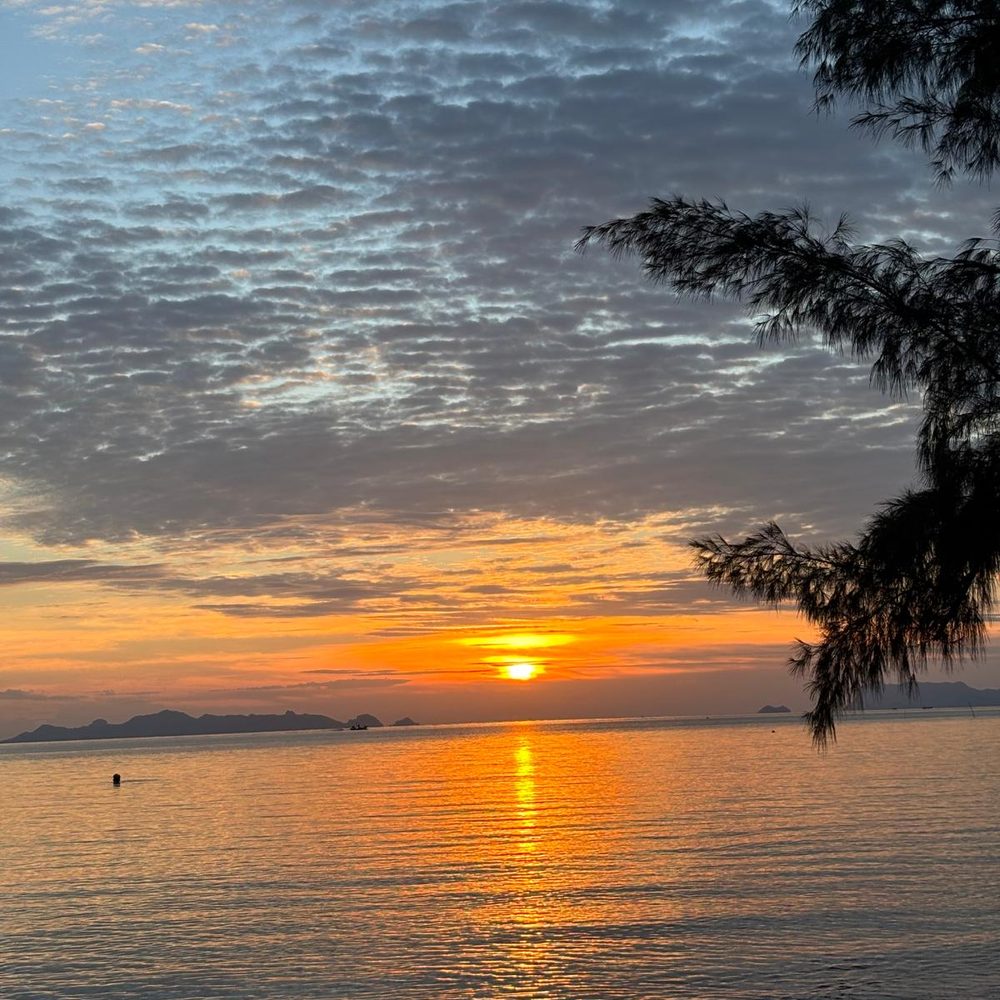 Sunset under rainy season clouds over the Gulf of Thailand, Laem Yai Beach, Green Heaven Bungalows, Koh Samui
